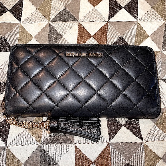 Michael Kors Handbags - Michael Kors Quilted Tasseled Continental Wallet